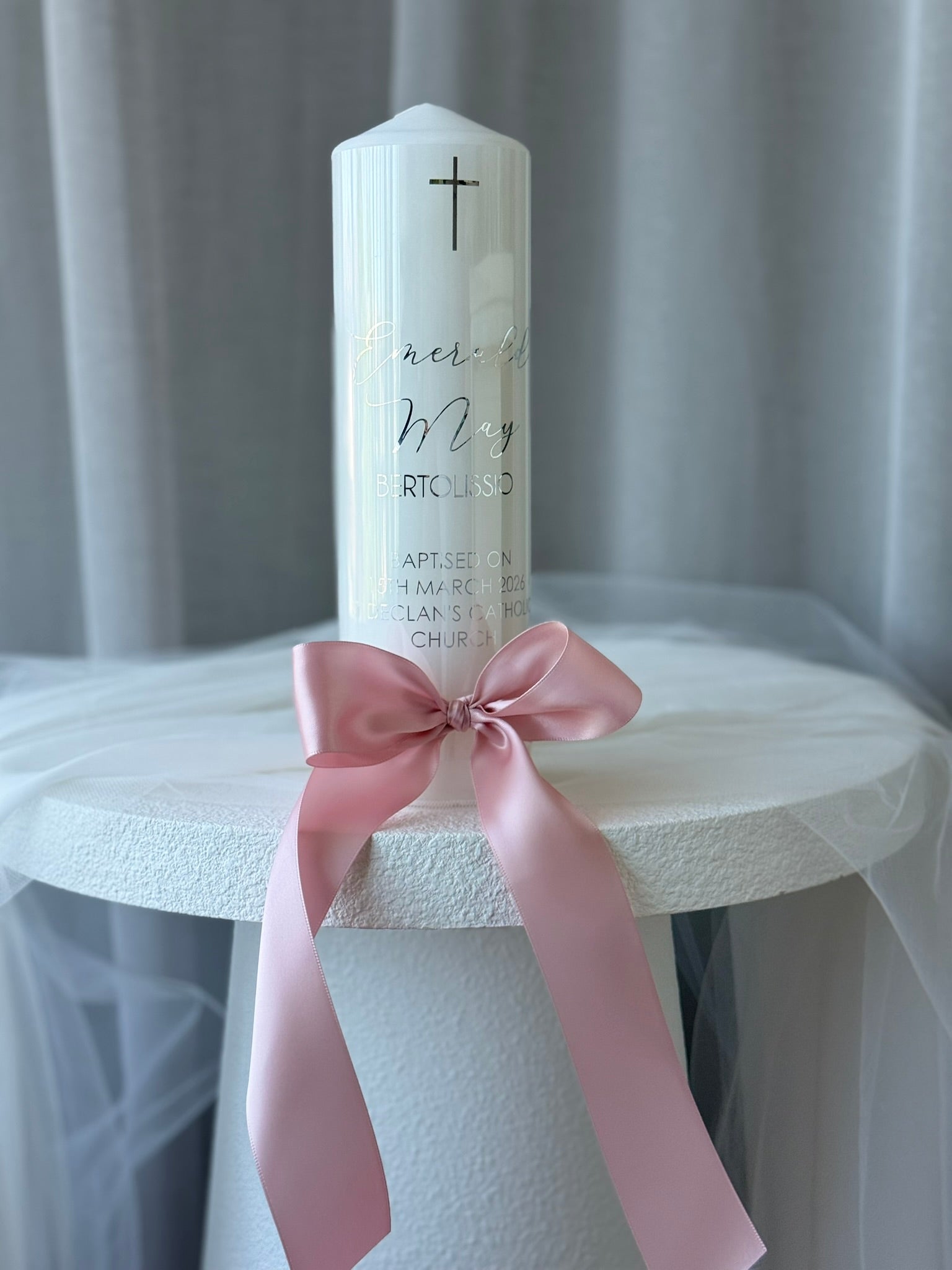 elegant christening candle satin bow detail