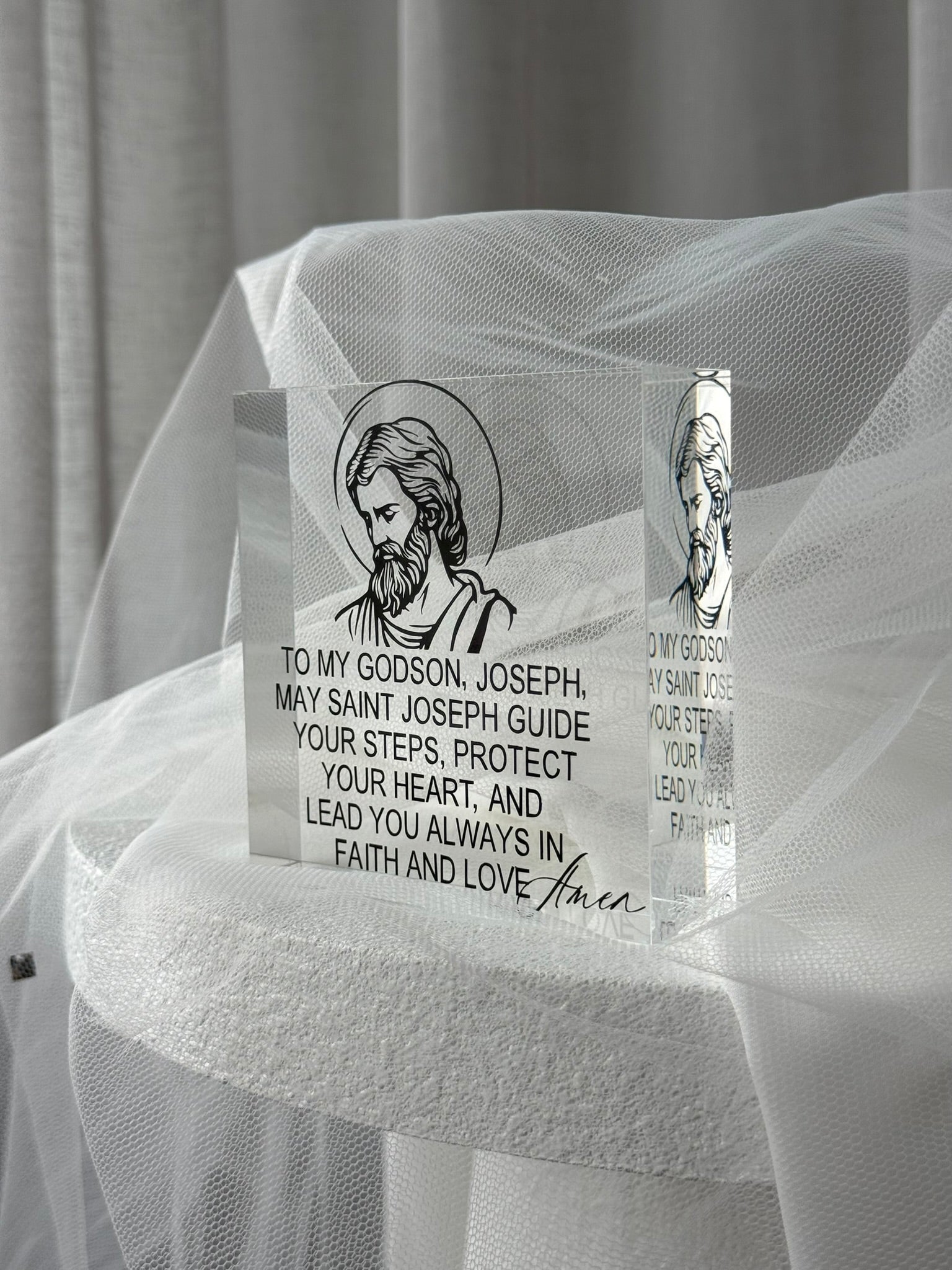 Close up of acrylic saint prayer block showing personalised name and engraved Catholic prayer text
