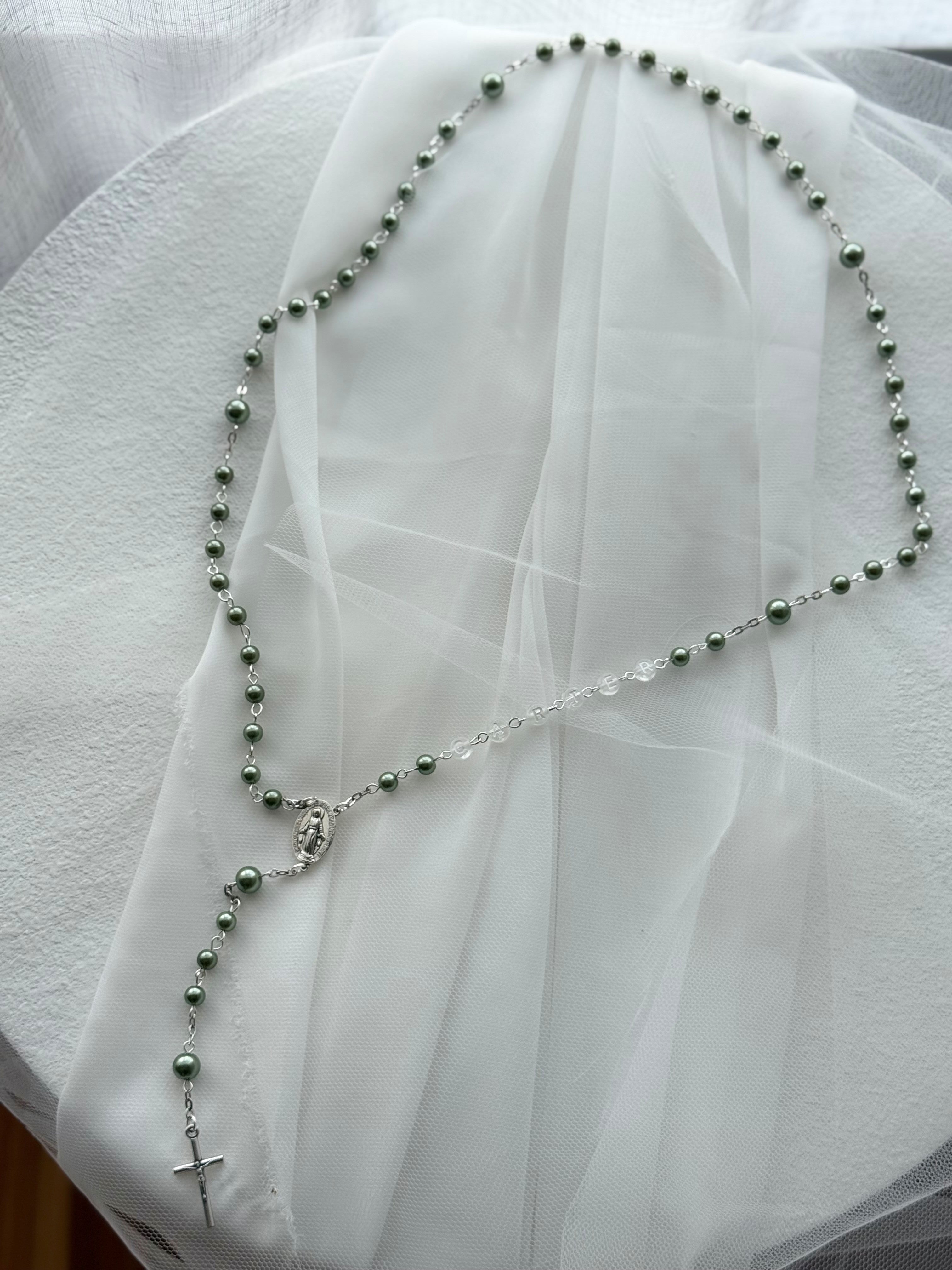 Personalised sage green rosary beads with detailed crucifix and keepsake box, handcrafted in Australia for Baptism or Christening